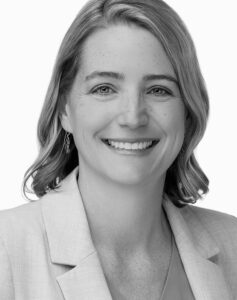 Stefanie Deal, Executive Vice President and Principal Architect, smiling in black and white professional headshot