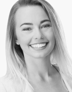 Veronica Villarreal, Senior Job Captain, smiling black and white professional headshot