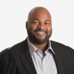 John, FPBA Senior Project Director, smiling in professional headshot