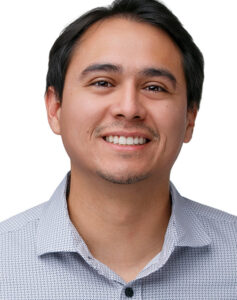 Misael Rojas, Junior Designer, smiling in a professional headshot
