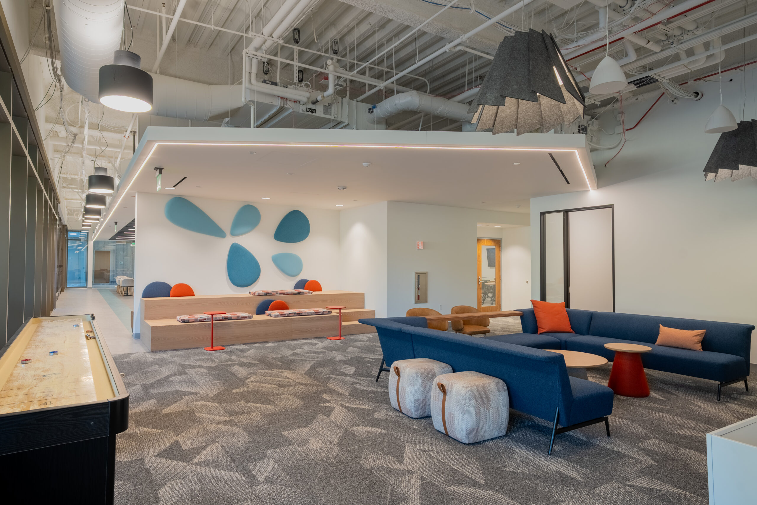 Open-concept office lounge and collaboration area.