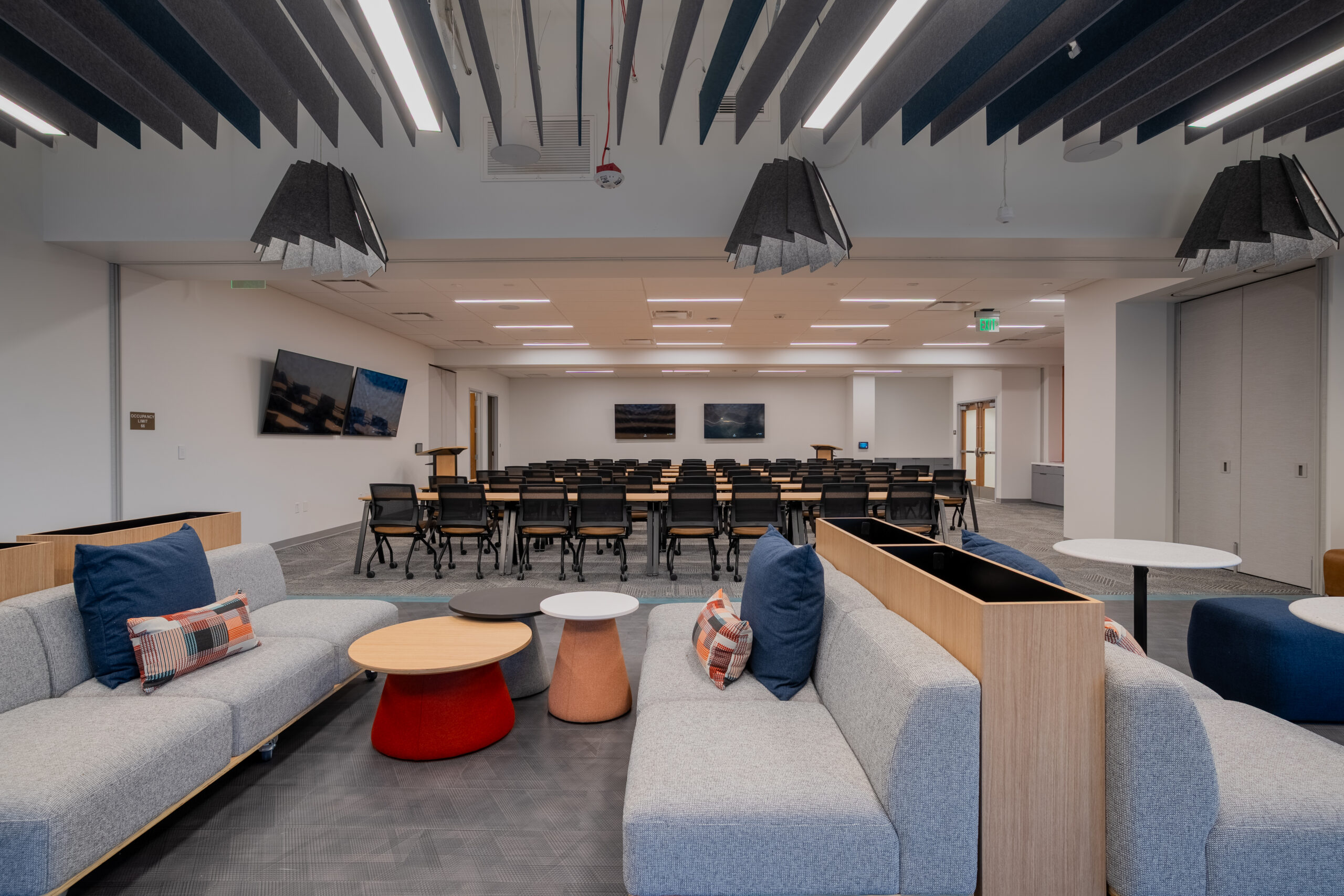 Contemporary office lounge and multipurpose space at Healthpeak Properties, 4930 Directors Place in San Diego, CA.