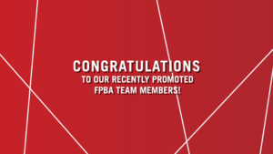 Ferguson Pape Baldwin Architects corporate graphic with a red background overlaid with thin, intersecting white lines that form a web-like pattern. In the center is a bold, white sans-serif capital letters: "Congratulations to our recently promoted FPBA team members!"